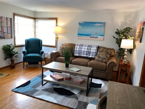 Nicely Furnished Living Room with new Simmons queen sleeper sofa.