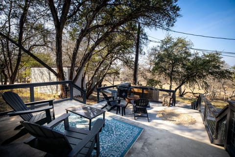 Fire pit and comfy seating for relaxing nights outdoors.