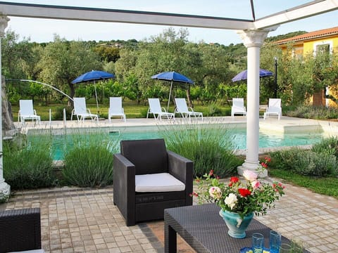 Plant, Sky, Property, Botany, Flower, Shade, Outdoor Furniture, Interior Design, Tree, Grass