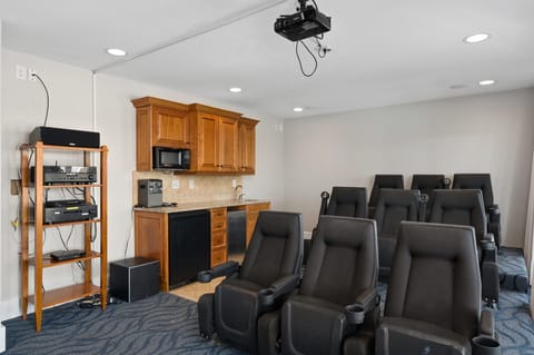 NH145: One Of These Nights | ML Theater Room with wet bar