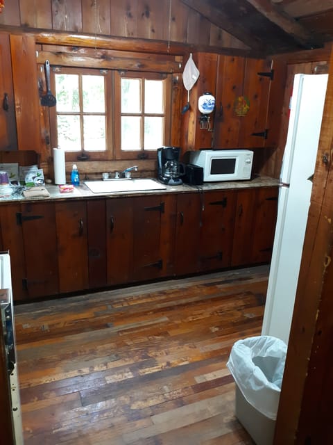 kitchen ...very functional and fully stocked with all pots pans dishes tableware