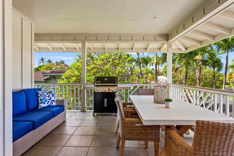 Outdoor dining and seating on the expansive lanai (patio), complete with BBQ for the home chef.