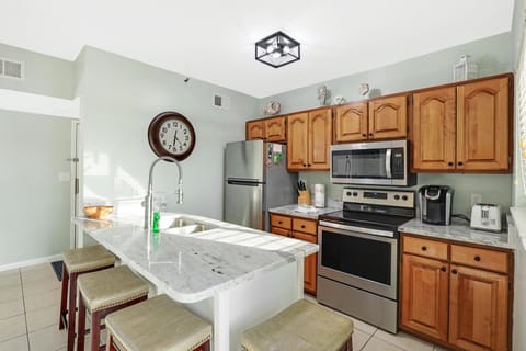 Kitchen - Both large and small appliances are offered for convenience of meal prepping during your stay.