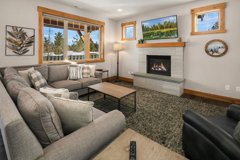 The Getaway: - Fantastic great room with comfortable couches and a gas fireplace.