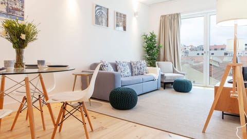 Relax in a bright and elegant living space designed for comfort, featuring contemporary décor, natural light, and charming Lisbon views. #ModernLiving #LisbonStay #CityApartment #BoutiqueStay #Portugal #PT #Lisbon