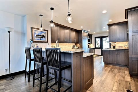 Gourmet Kitchen and Seating for Three at the Bar