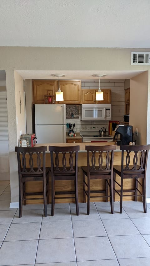 Looking from the living room to the kitchen