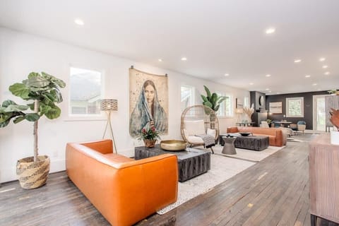 Living room has low comfortable leather couches for unobstructed views throughout room.