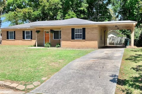 Front of house with Carport!