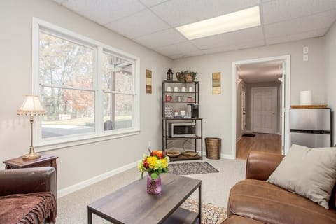 Sitting area with Coffee bar and Fridge.