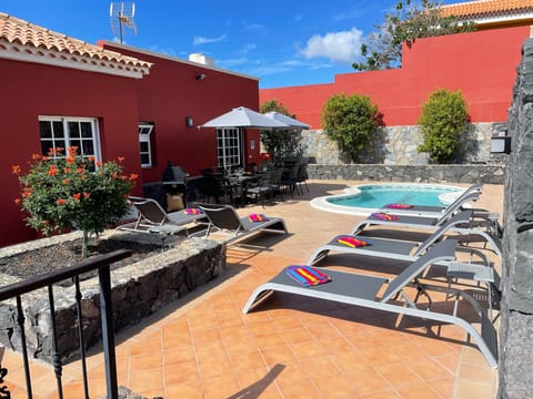 View of private heated pool and terrace