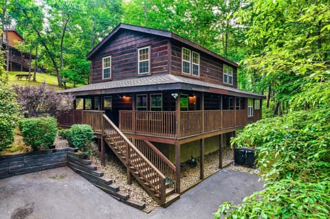 - Wraparound cabin with forest views and easy access to mountain paths   - Warm wood exterior ideal for relaxing forest stays and calm mornings   - Perfect base for Smoky Mountain adventures all year long