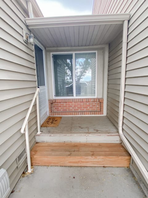 Backdoor entrance with two small steps