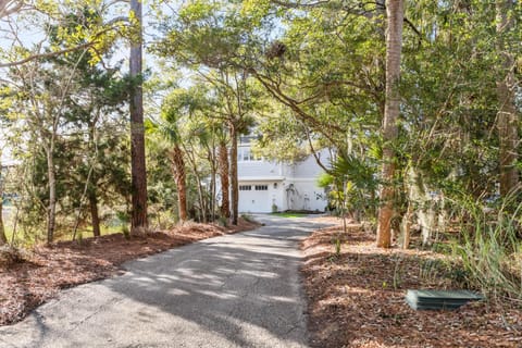 The house sits well off the lane and there is no house to the left.
