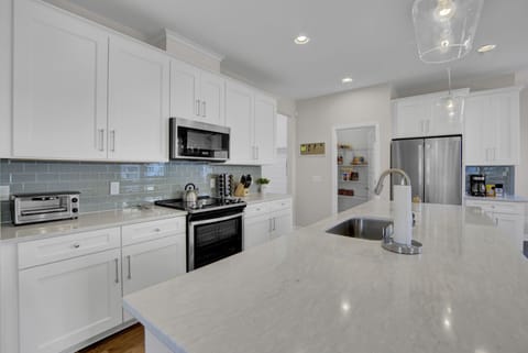 This kitchen is more than beautiful, it's a cooks dream. 