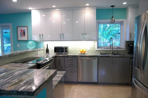 Updated kitchen, stainless steel appliances and under counter wine fridge.