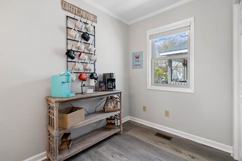 Coffee Bar with Kuerig & Coffee Maker & large beach themed Rae Dunn mugs.  