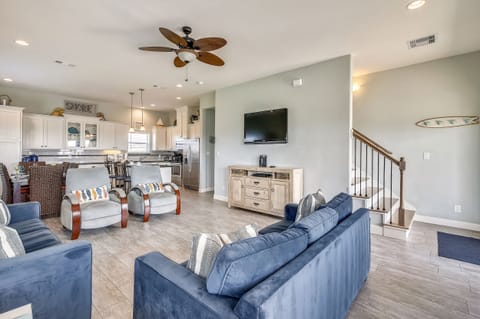 Gather in the Living Room For a Movie Night! - Pop a few bowls of popcorn, put a movie in, and settle in for a fun family night. The TV keeps the group entertained any time of year!