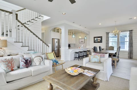 Pure Beauty - Rich decor paired with a harmonious color palette makes the living area the perfect space to plan out your day while enjoying much-needed family bonding time.