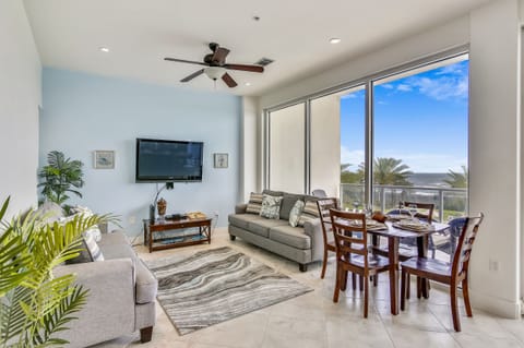 Windows Galore - The large, elegant windows allow the living room to be filled with lots of natural lighting.