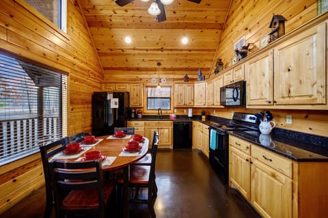 Granite counters and fully stocked kitchen. 