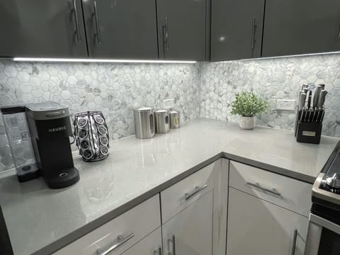 Fully equipped Kitchen with stainless steel Cuisinart Cookware and Cutlery