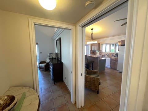 View into Master bedroom and Kitchen and living space