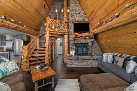 Gorgeous spiral cedar staircase!