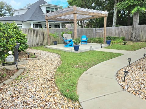 The entire fenced yard is your private oasis outside the suite.