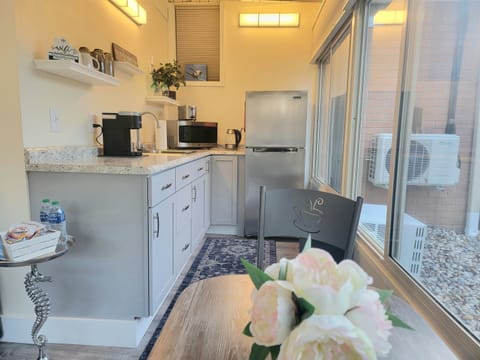 The kitchenette comes equipped with microwave, toaster, electric kettle, double burners, pans and equipment to make great things like scrambled eggs or Mac n cheese. To grill a steak, use the gas grill out near the patio.