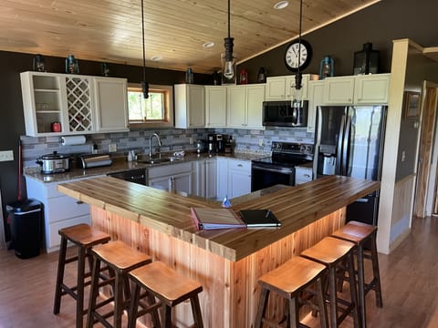 New appliances, coffee pot, tea kettle, crock pot, waffle maker, and blender. 