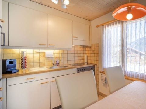 Cabinetry, Countertop, Property, Kitchen Sink, Kitchen Appliance, Sink, Kitchen, Orange, Interior Design, Lighting