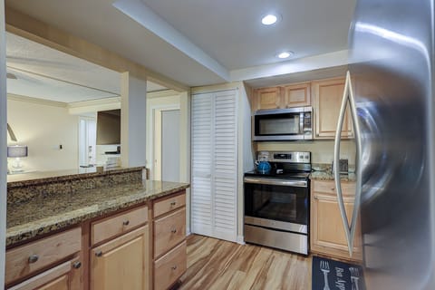 Kitchen has a brand-new Refrigerator, dishwasher, microwave, stove, plenty of dining ware, cooking utensils, eating utensils, pots and pans.