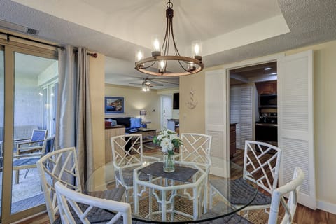 Dining Room overlooks the Balcony and steps to the Living Room.