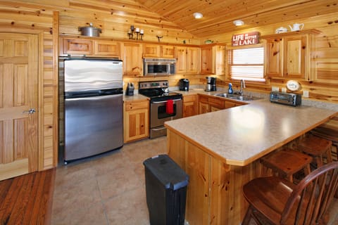 Kitchen has everything you need to cook while enjoying the view out the window