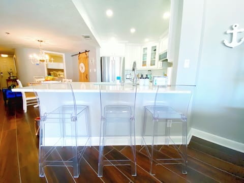 Counter Space w/ Barstools and Kitchen View From Living Room