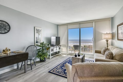 Gather in the Living Room For a Movie Night! - Pop a few bowls of popcorn, put a movie in, and settle in for a fun family night. The TV keeps the group entertained any time of year!