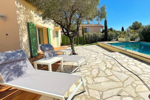 Terrace with swimming pool adjoining the living room