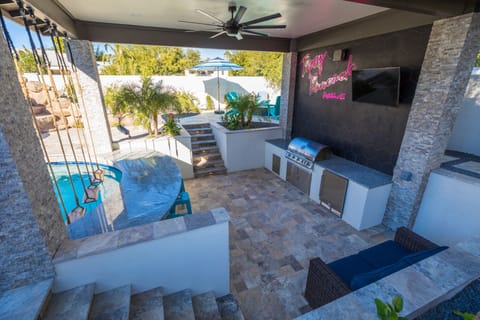 Enjoy the TV at the swim up bar!