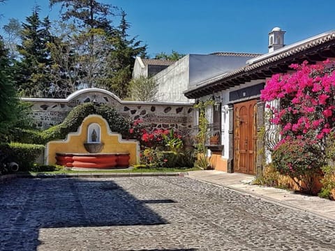Spanish Style home  with Courtyard and rooftop deck in guard gated community