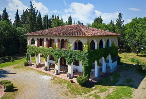Charming Tuscan Villa Albertina surrounded by lush greenery 