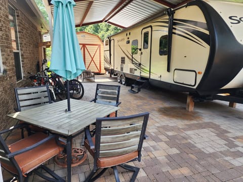 Home away from home. Outdoor table and seating. Grill available for use too. 