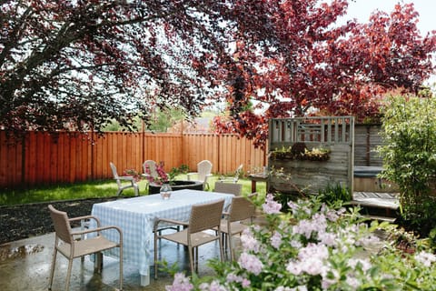 Backyard with outdoor seating (additional table and chairs available)