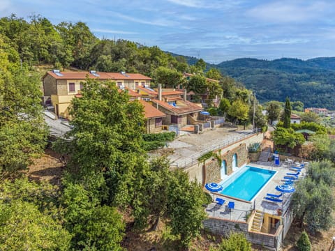 Furniture, Property, Ceiling Fan, Cabinetry, Table, Couch, Lighting, Picture Frame, Wood, Countertop