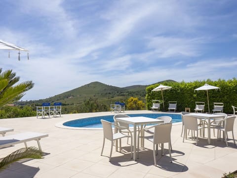 Cloud, Sky, Table, Property, Furniture, Azure, Chair, Swimming Pool, Outdoor Furniture, Shade