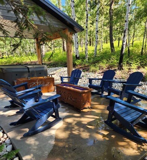Relax by the outdoor gas fire pit near the hot tub...heaven!