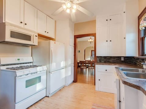 Flow Freely Between Cooking and Connecting, Thanks to the Open Layout Linking Kitchen and Dining Spaces