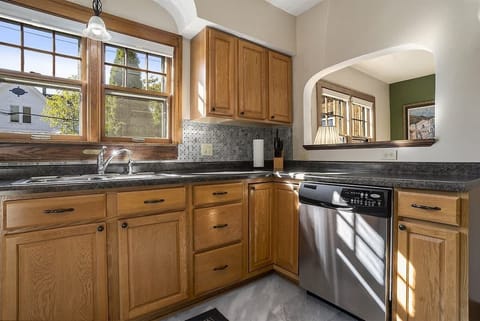 Never Miss a Moment - The Kitchen`s Wall Cutout Into the Dining Room Ensures You`ll Be a Part of Every Memory