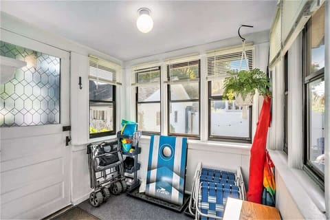 Everything Included for a Fun-filled Day in the Sand - Beach Chairs, a Beach Umbrella, a Beach Wagon, Even Cornhole