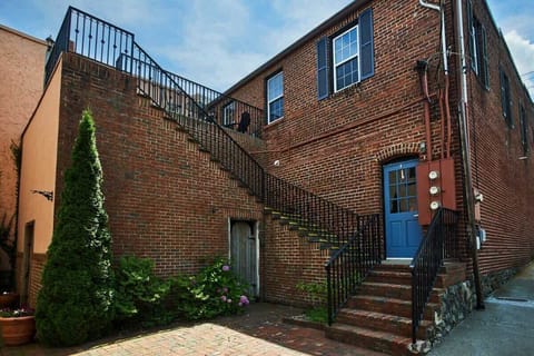 Watch the world go by from your sweet little retreat overlooking Main Street and the Park
